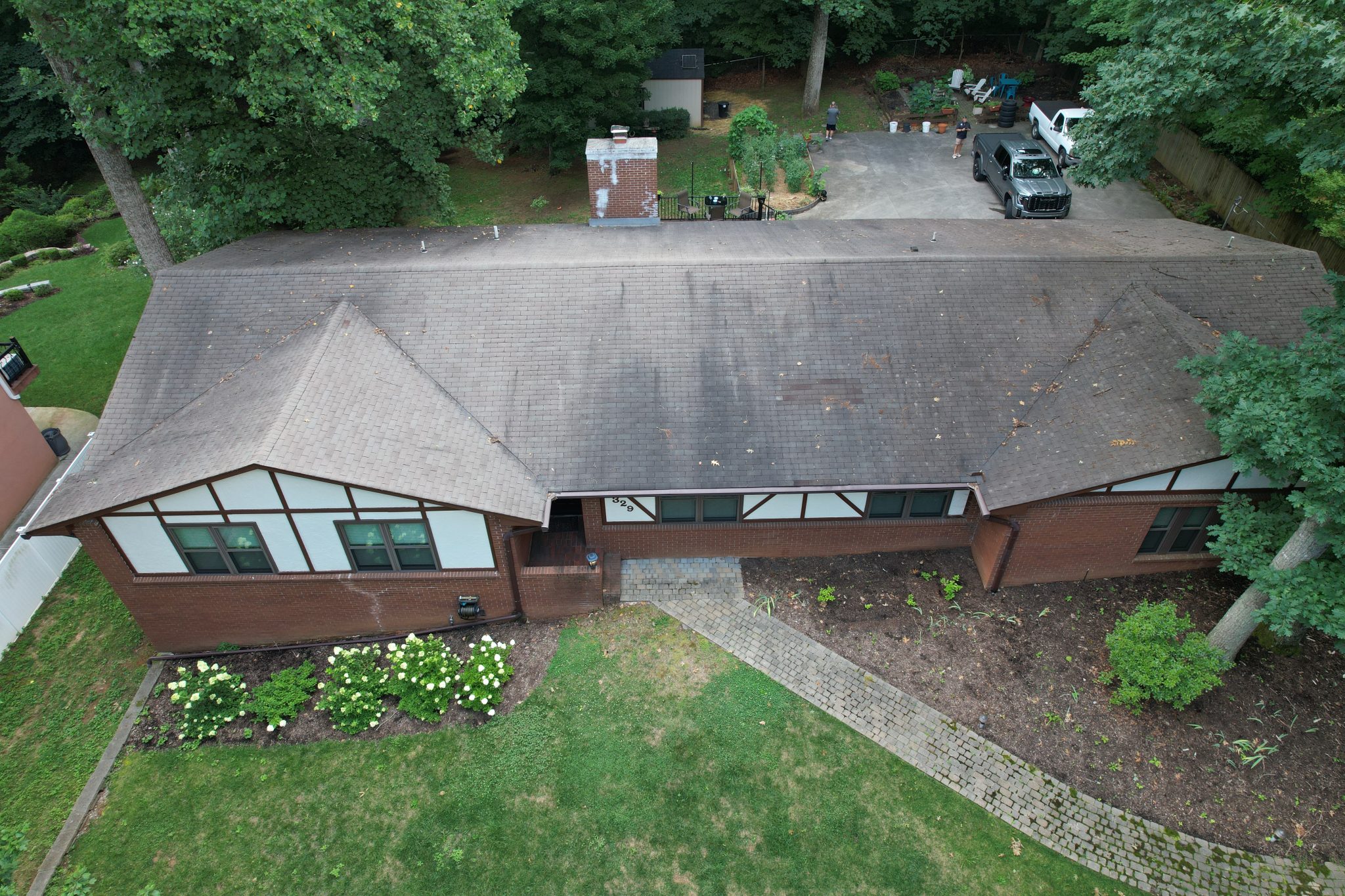 West Knoxville roof replacement project before installation showing the home’s aging asphalt shingle roof.