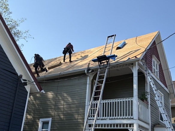 Roof decking being installed on a Knoxville, TN home during a new roof replacement by Mountain View Exteriors.