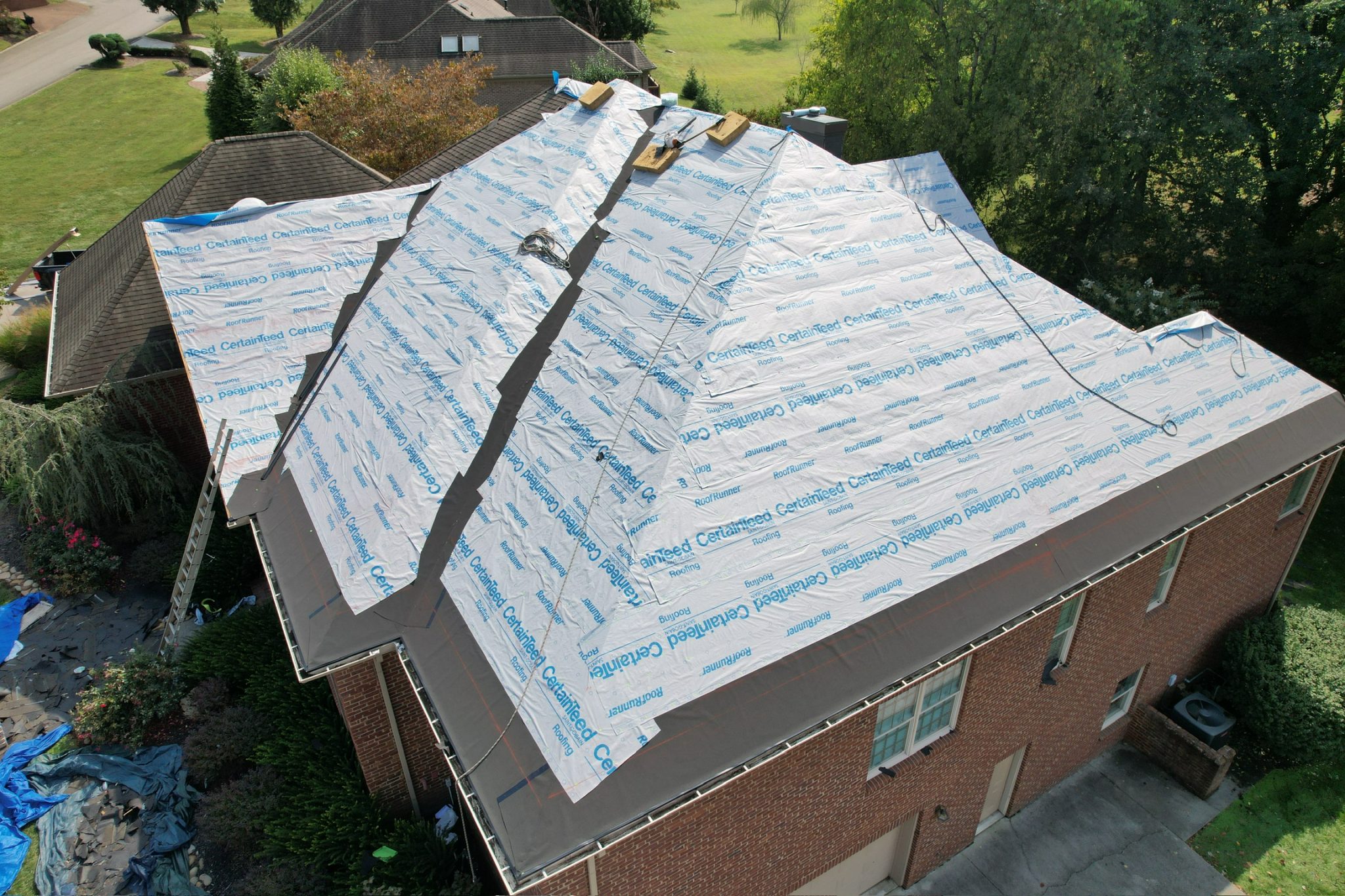 default A Knoxville home roof under construction with CertainTeed underlayment, prepared for roofing services with clean edges and safe staging.