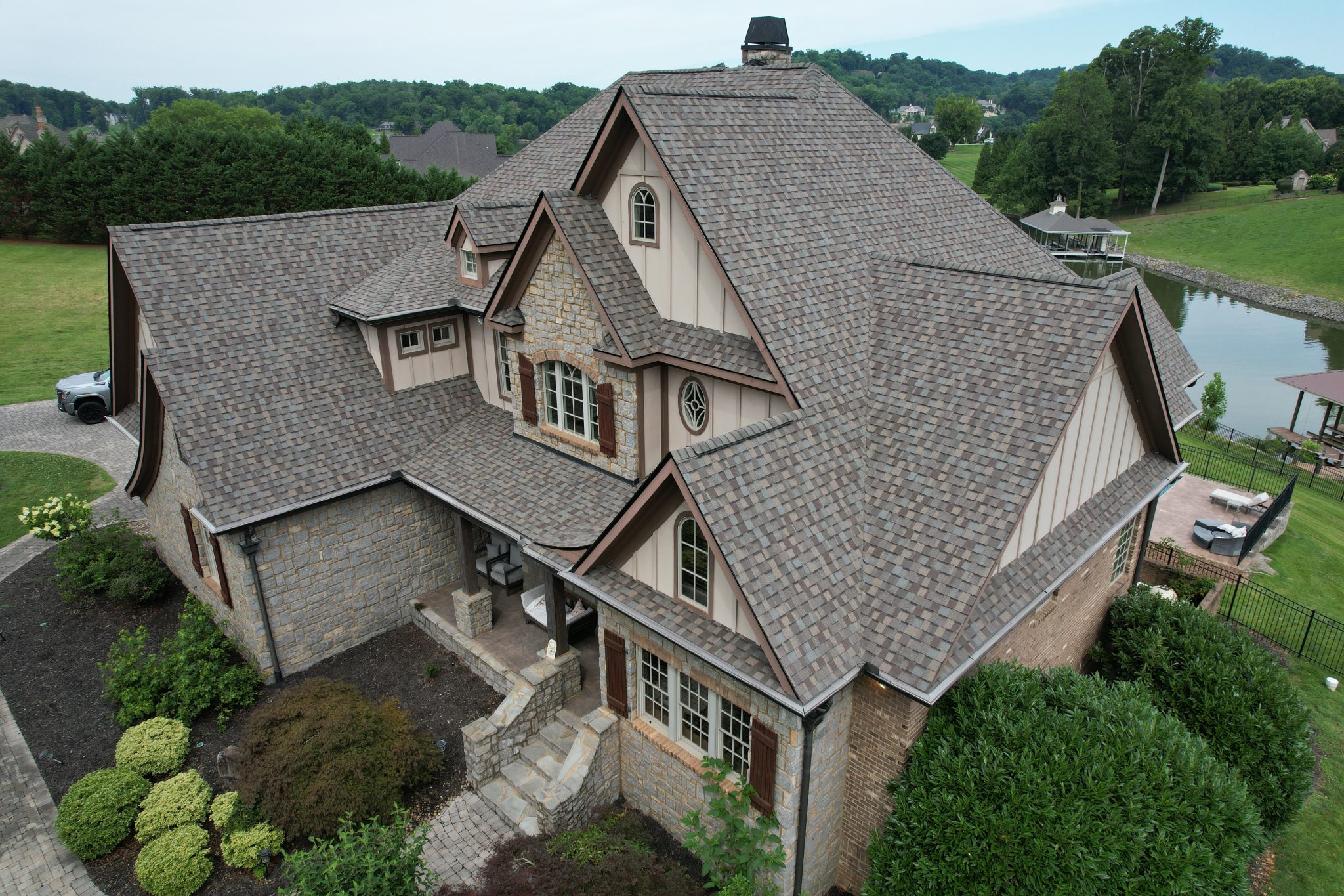 Completed Steep-Slope Roof Replacement in Louisville, TN Completed steep-slope roof replacement with CertainTeed Landmark PRO Max Def Weathered Wood shingles in Louisville, TN.